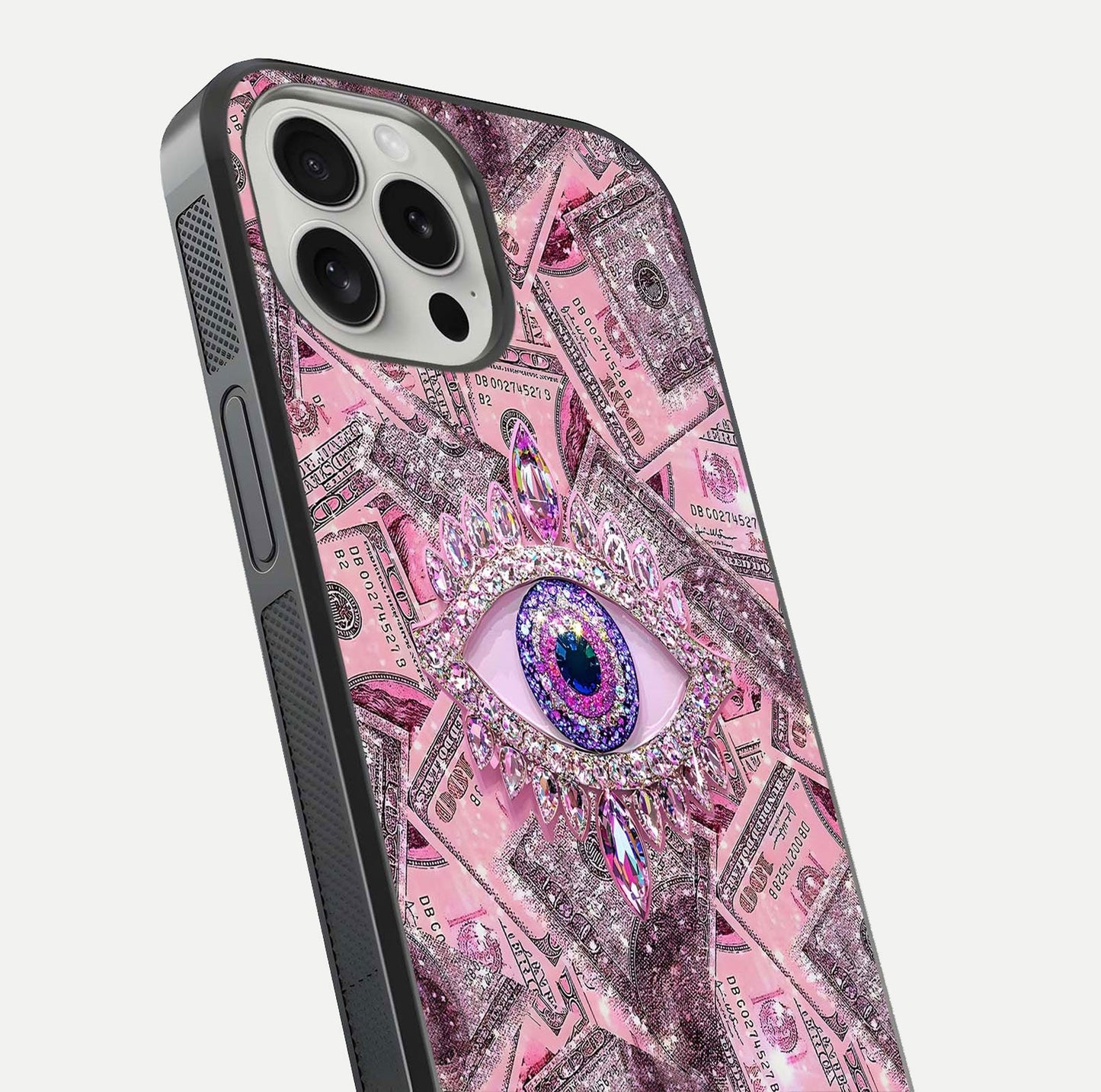 Money Eye Luxe Glass Case for iPhone 16 Pro close-up angled shot showing gold detailing and reflection shine