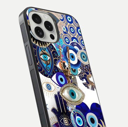 Mystic Charm Eye Glass Case for iPhone 16 Pro close-up angled shot showing detailed eye art and reflection