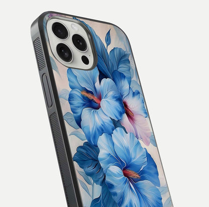 Ocean Hibiscus Grace Glass Case for iPhone 16 Pro close-up angled shot highlighting floral glow and HD shine