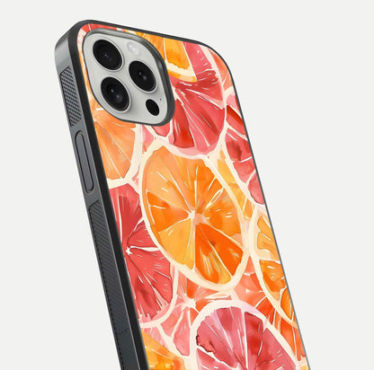 Orange Fruits Pattern Glass Case for iPhone 16 Pro close-up angled shot showing juicy fruit texture and reflection