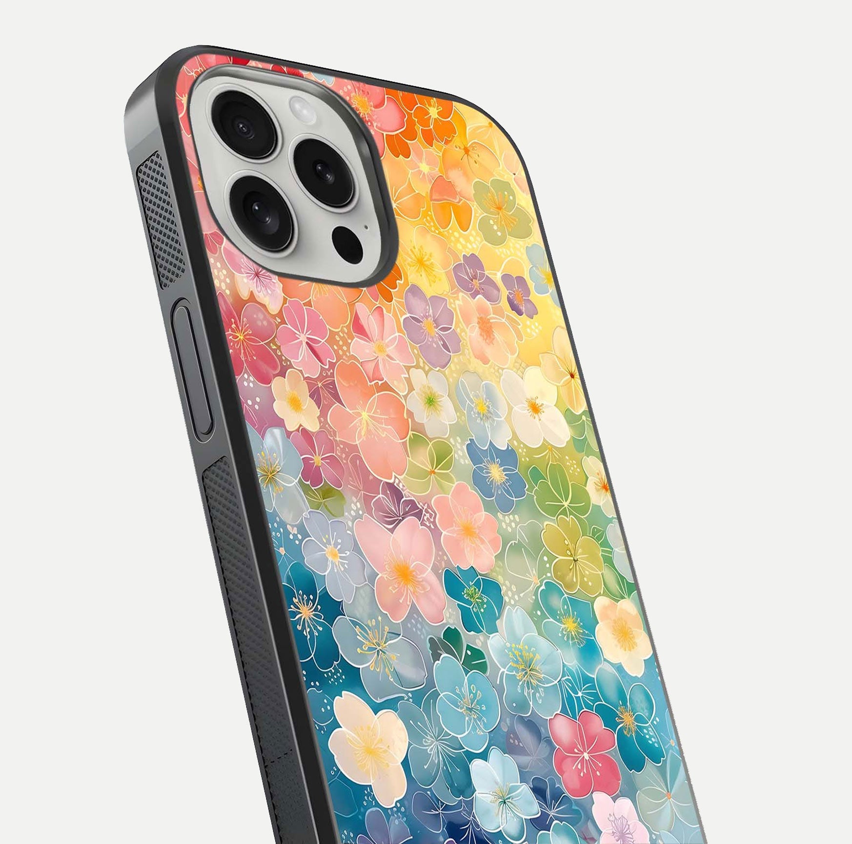 Rainbow Blossom Burst Glass Case for iPhone 16 Pro close-up angled shot showing petal colors and reflection