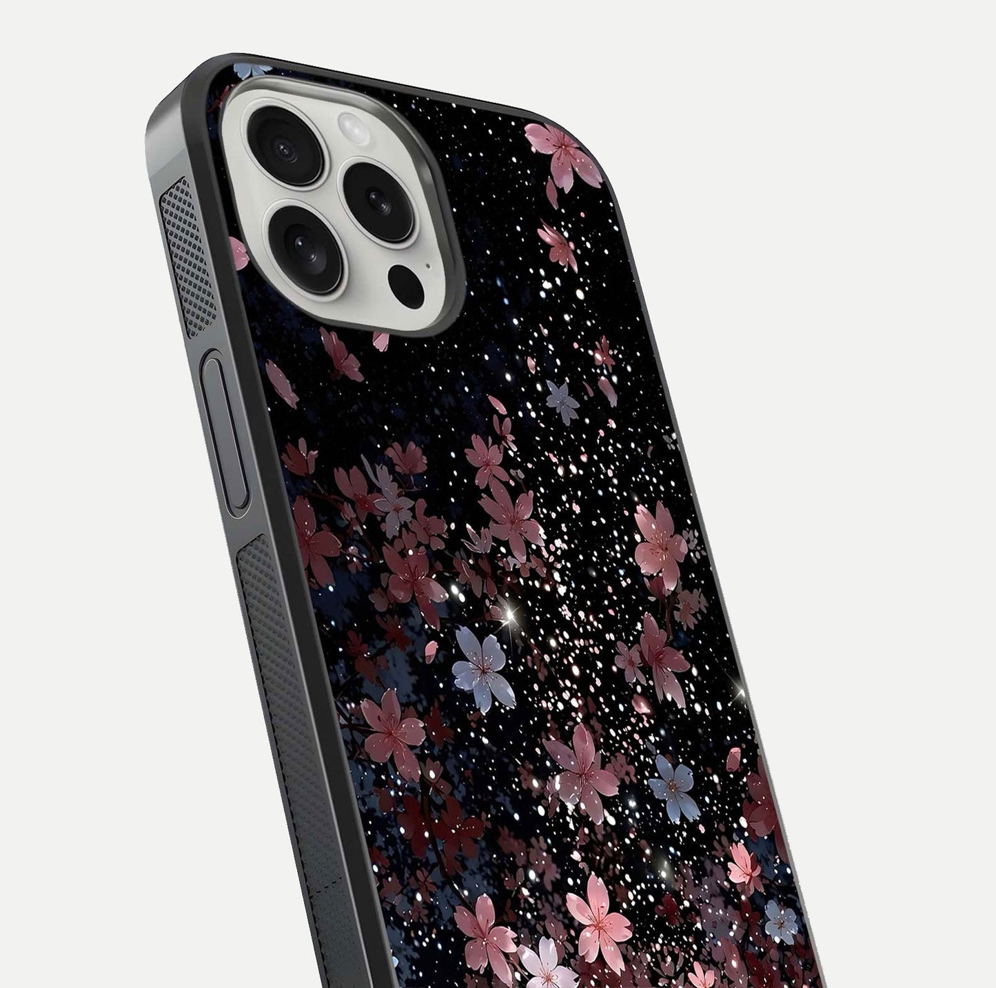 Starlit Flower Dreams Glass Case for iPhone 16 Pro close-up angled shot highlighting petal reflection and HD depth