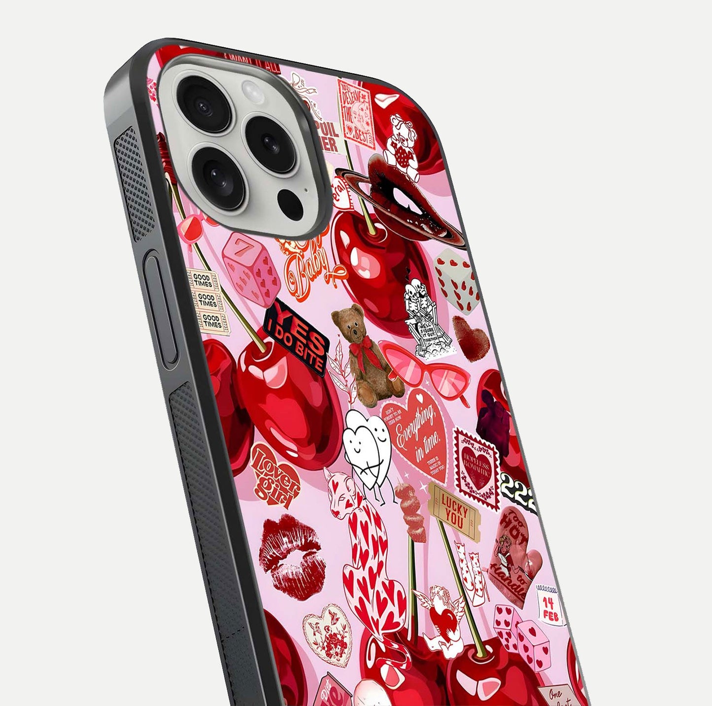 Sweet Cherry Chaos Glass Case for iPhone 16 Pro close-up angled shot highlighting red tone contrast and reflection