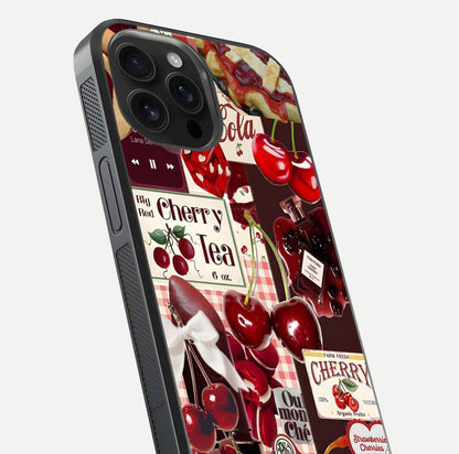 Aesthetic Cherry Tea Glass Case for iPhone 16 Pro Max close-up angled shot showing detailed cherry artwork, red tones, and gloss reflection