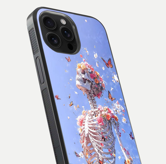 Bloom Beyond Bones Glass Case for iPhone 16 Pro Max close-up highlighting unique bone-floral fusion art and reflection