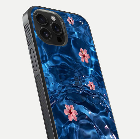 Blooming Water Drift Glass Case for iPhone 16 Pro Max close-up angle showing petal details, soft aqua tones, and smooth gloss reflection