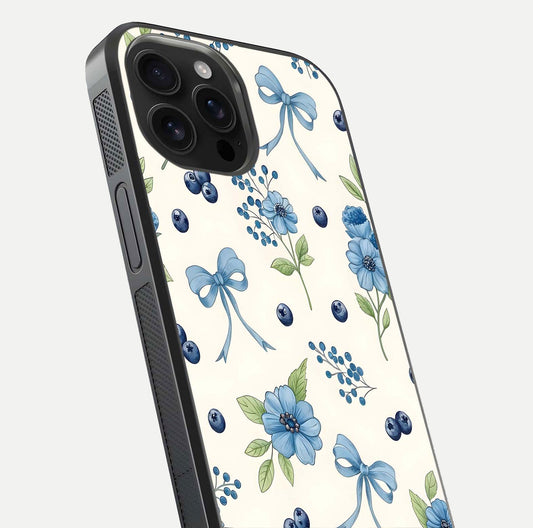 Blue Flower & Bow Glass Case for iPhone 16 Pro Max close-up shot highlighting ribbon detail and flower gloss finish