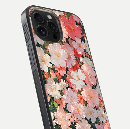 Blush Bloom Field Glass Case for iPhone 16 Pro Max close-up shot capturing pastel flower field tones and gloss shine