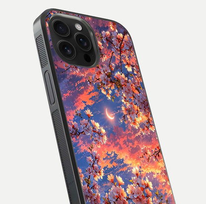 Celestial Sakura Sunset Glass Case for iPhone 16 Pro Max close-up image highlighting blossom petals and gloss shine