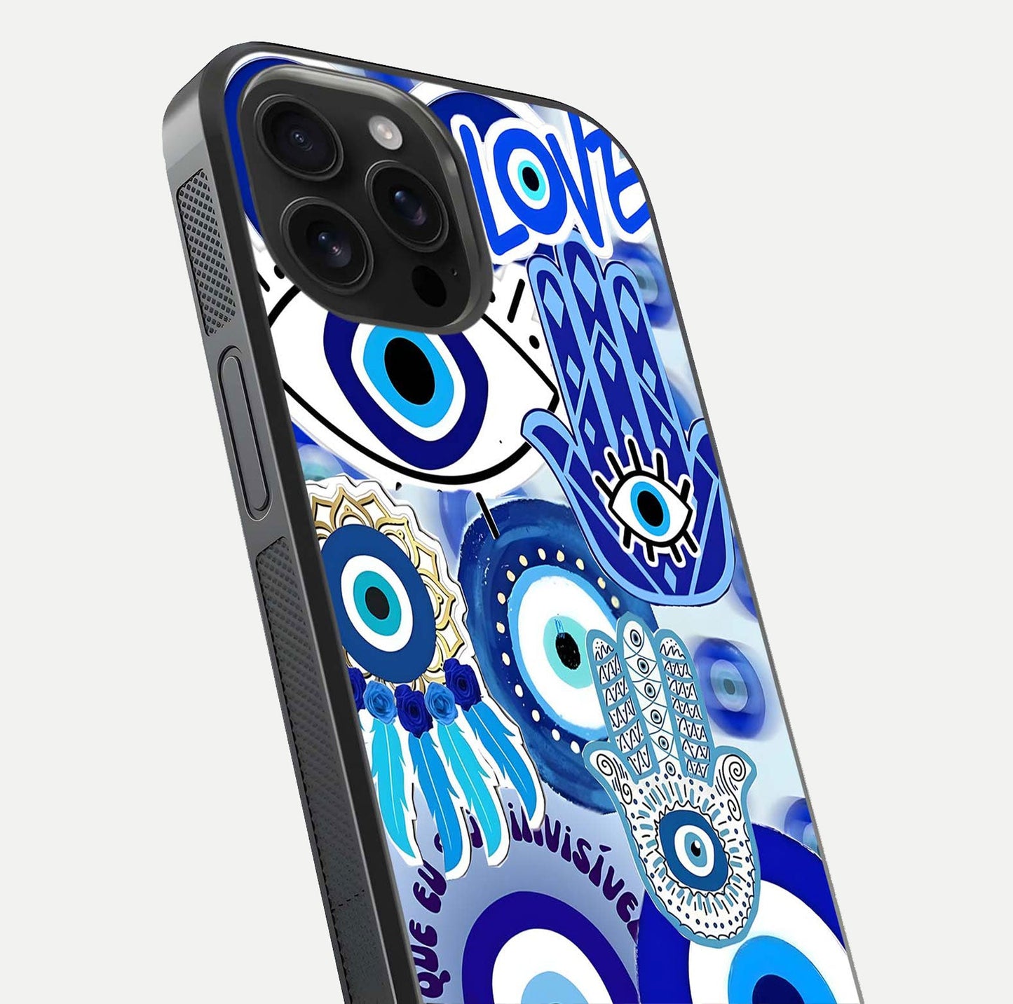 Evil Eyes Dream Glass Case for iPhone 16 Pro Max close-up highlighting evil-eye charm detail and light reflection on glass