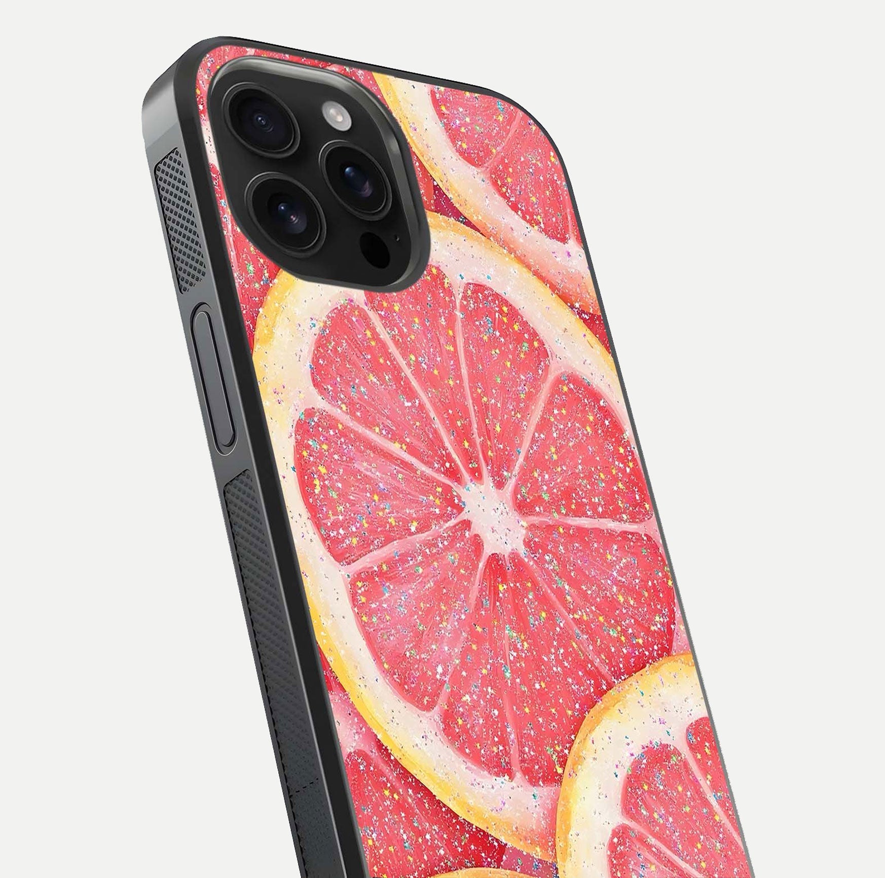 Glitter Grapefruit Glass Case for iPhone 16 Pro Max close-up angled shot showing fruit texture and glitter reflection