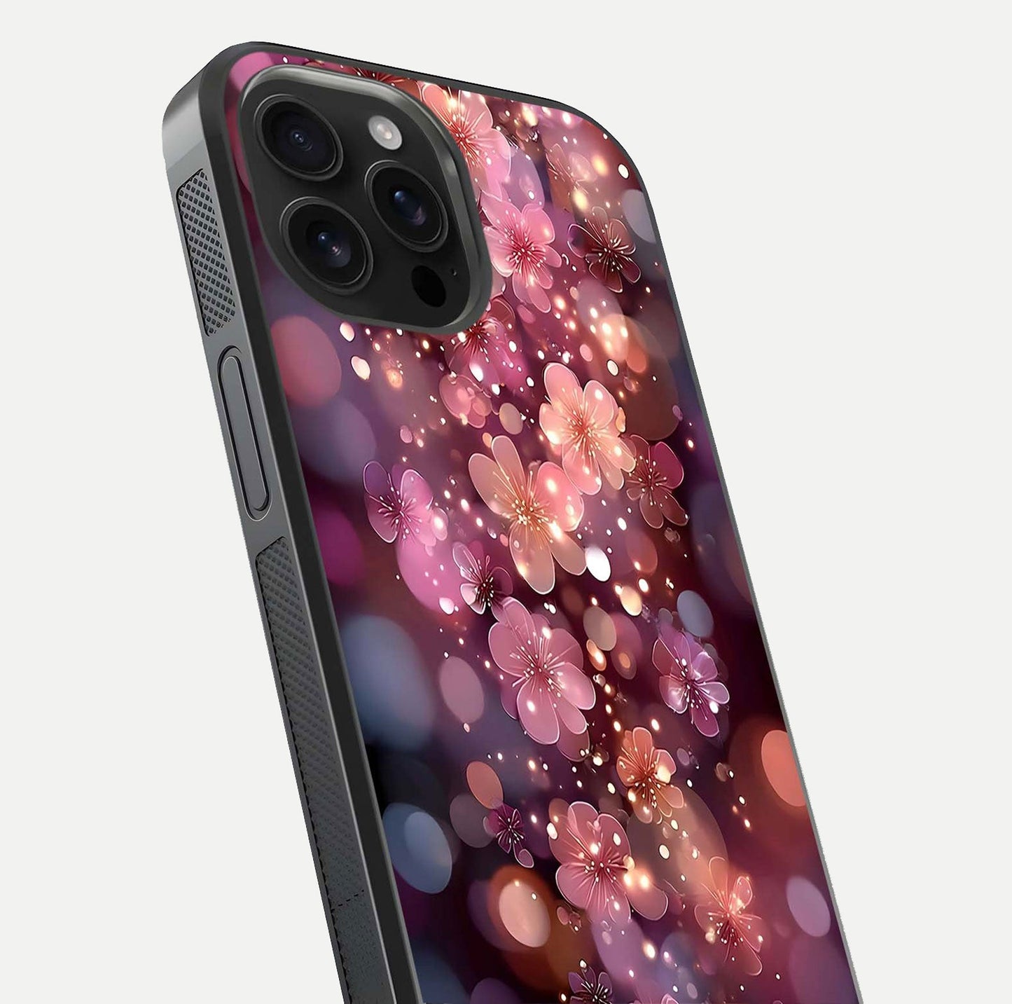 Glowing Petal Bliss Glass Case for iPhone 16 Pro Max close-up angled shot showing petal glow, color depth, and reflection shine