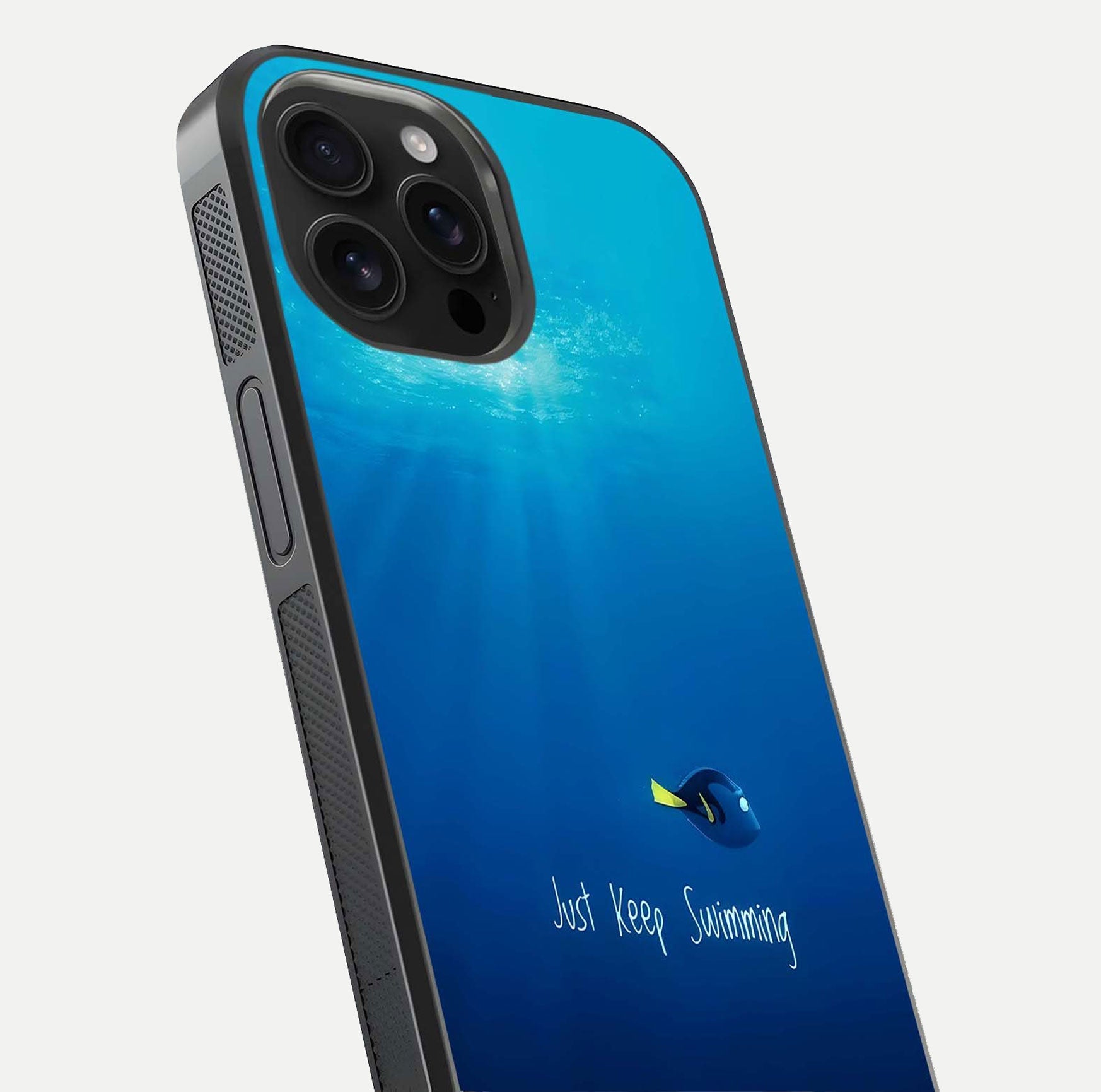 Just Keep Swimming Glass Case for iPhone 16 Pro Max close-up angled shot showing elegant lettering and blue tone reflection