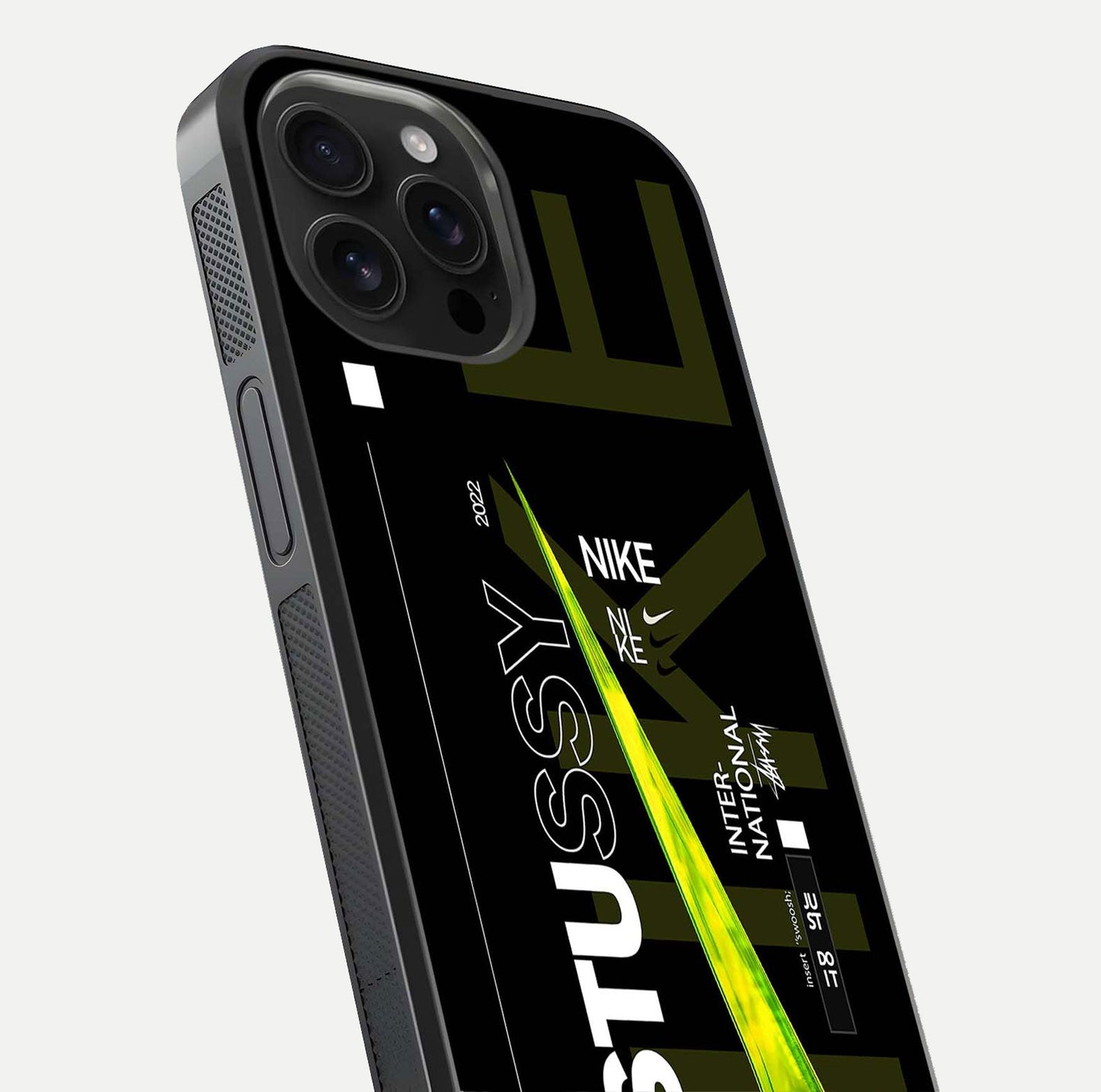 Neon Street Edition Glass Case for iPhone 16 Pro Max close-up angled shot showing urban neon lights and shine