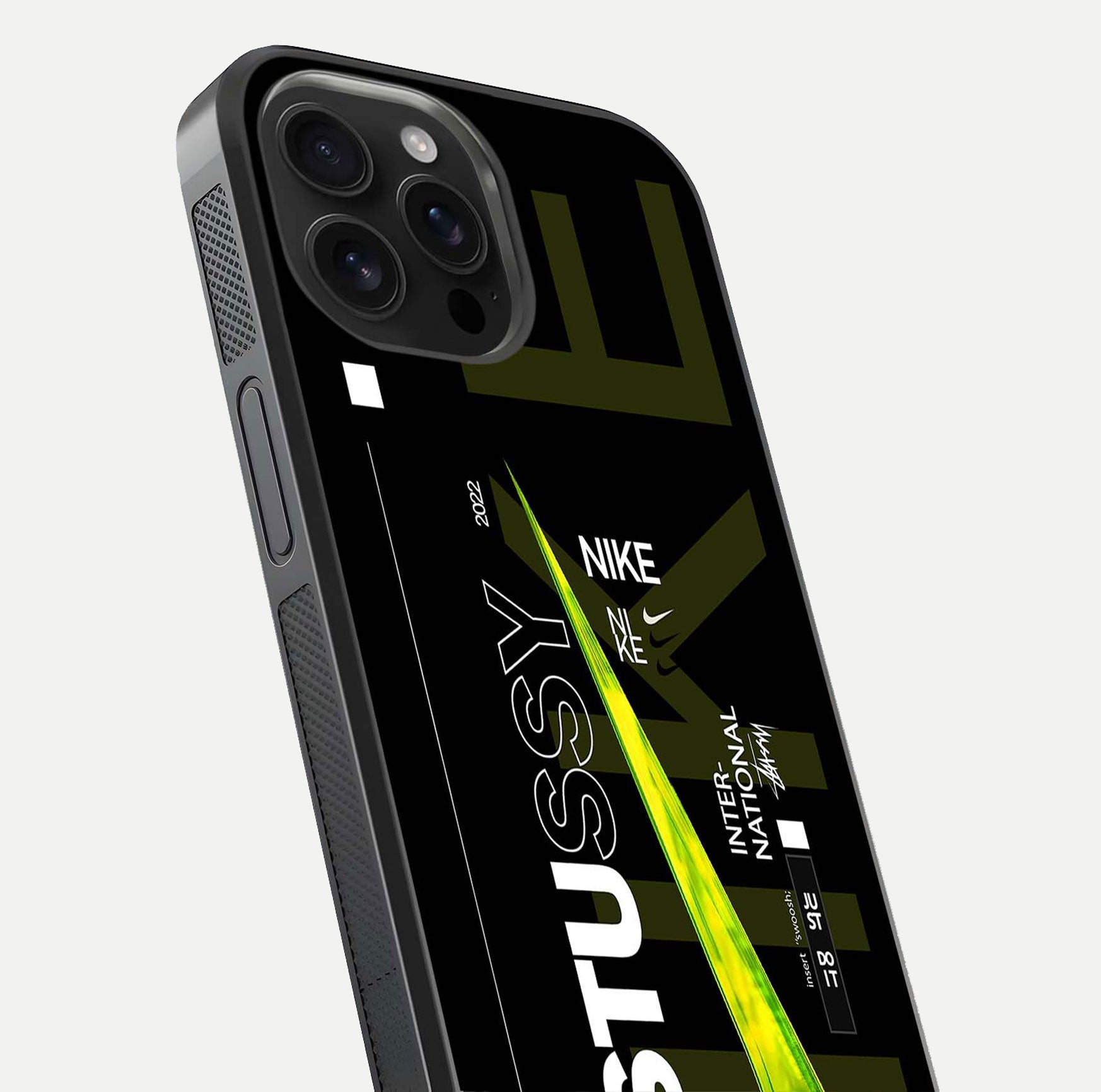 Neon Street Edition Glass Case for iPhone 16 Pro Max close-up angled shot showing urban neon lights and shine