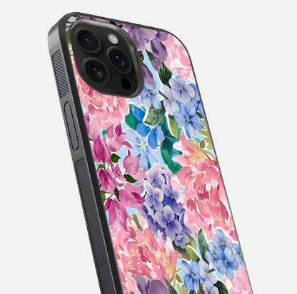 Pastel Floral Mix Glass Case for iPhone 16 Pro Max close-up angled shot highlighting flower detail and reflection