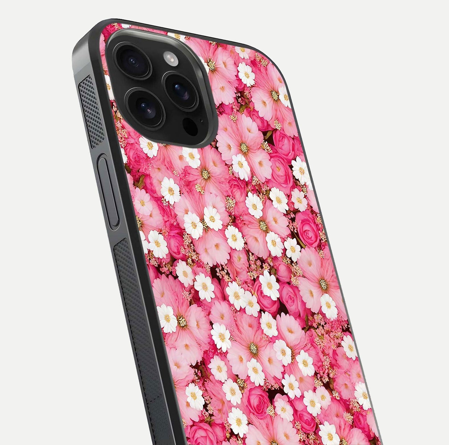 Pink Daisy Bliss Glass Case for iPhone 16 Pro Max close-up angled shot highlighting daisy detail and reflection glow
