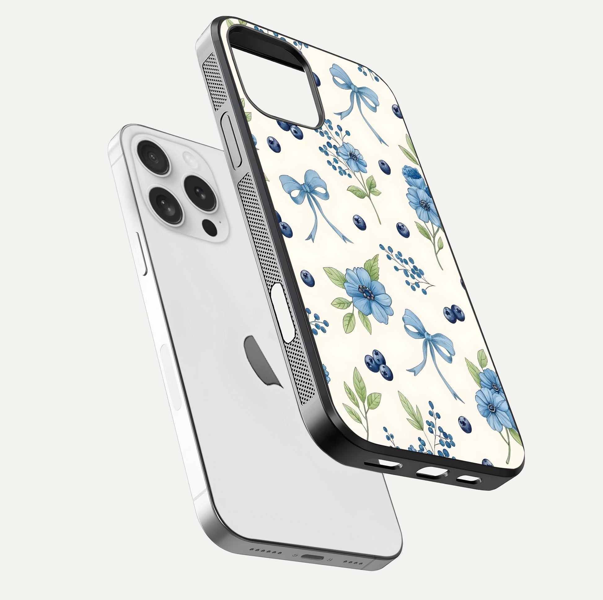 Blue Flower & Bow Glass Case for iPhone 16 Pro floating mockup capturing gloss reflection and girly aesthetic