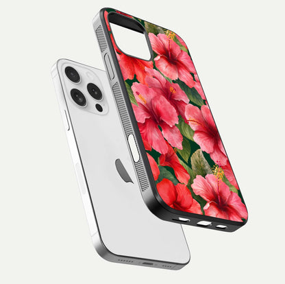 Hibiscus Pattern Glass Case for iPhone 16 Pro floating dual-view mockup showing glossy texture and vivid color depth