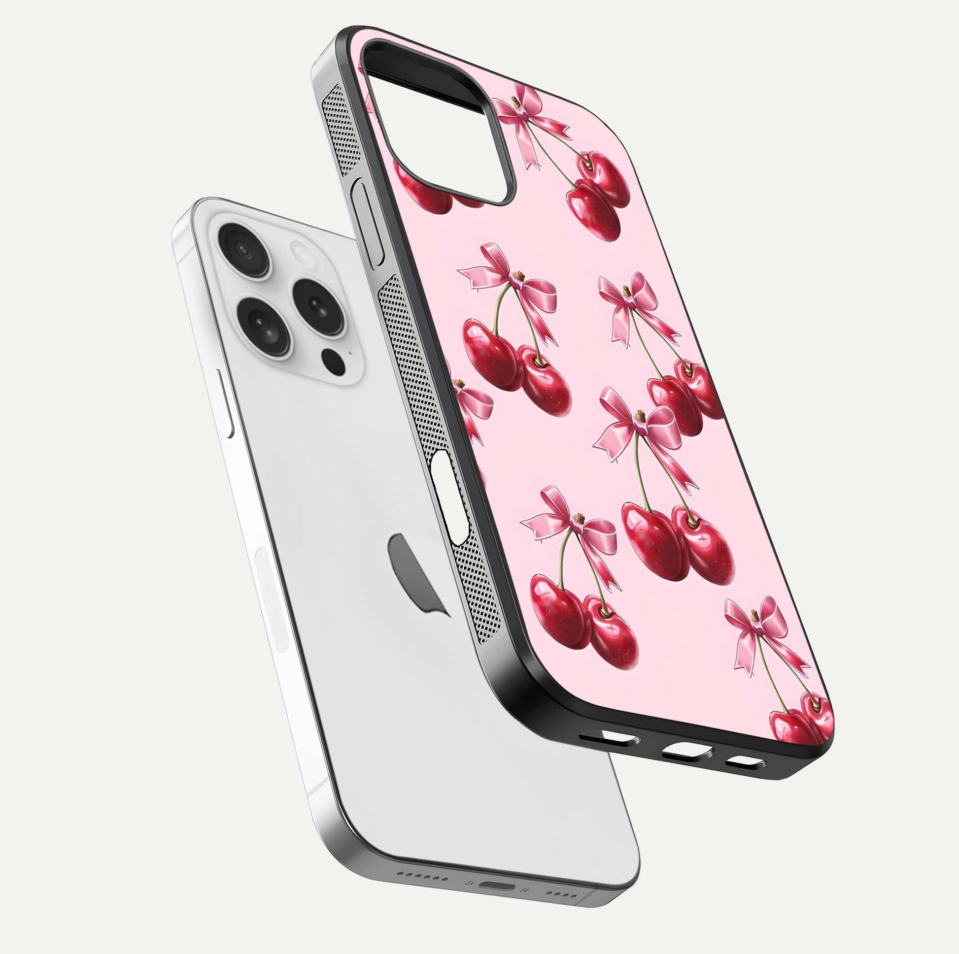 Red Cherries Pattern Glass Case for iPhone 16 Pro floating dual-view mockup showing gloss and color contrast