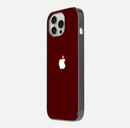 Apple Crimson Core Glass Case for iPhone 16 Pro side-angle shot showing camera bump alignment and glossy shine