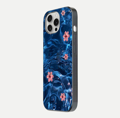 Blooming Water Drift Glass Case for iPhone 16 Pro side-angle image showcasing blossom flow, curved corners, and HD glass gloss