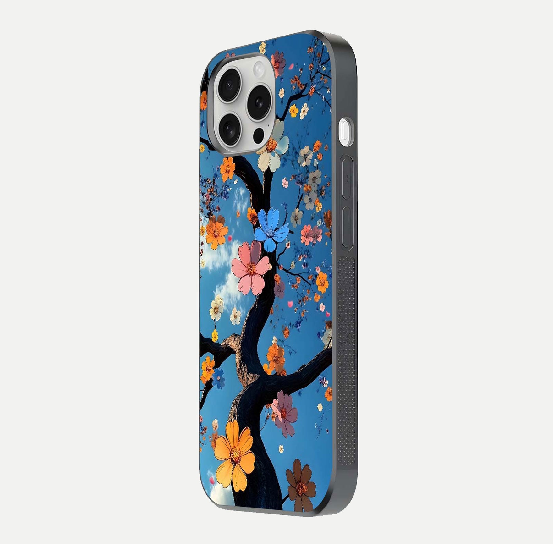 Blossom Dream Sky Glass Case for iPhone 16 Pro side-angle photo showing flower details, edge curve, and reflection shine