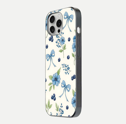 Blue Flower & Bow Glass Case for iPhone 16 Pro side-angle image showing bow-floral mix and HD finish shine