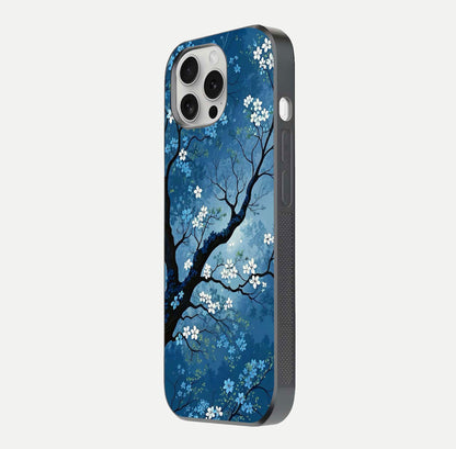 Blue Tree Serenity Glass Case for iPhone 16 Pro side-angle shot showing glossy edge and tree pattern reflection