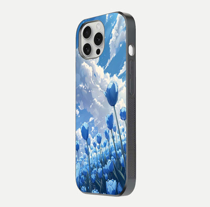 Blue Tulip Clouds Glass Case for iPhone 16 Pro side-angle image showing edge curve and flower reflection glow