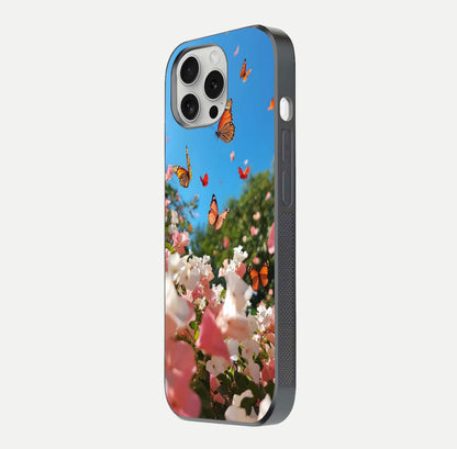 Butterflies in Bloom Sky Glass Case for iPhone 16 Pro side-angle image showing delicate details and gloss polish