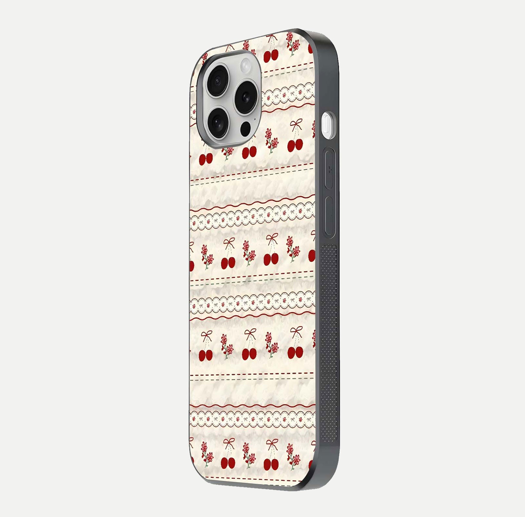 Cherry Bloom Charm Glass Case for iPhone 16 Pro side-angle photo showing flower detail and edge light