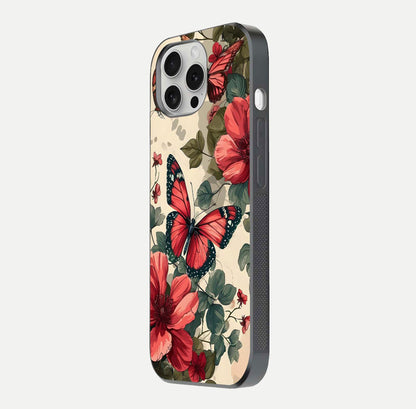 Crimson Butterfly Garden Glass Case for iPhone 16 Pro side-angle photo capturing gloss texture and soft tone