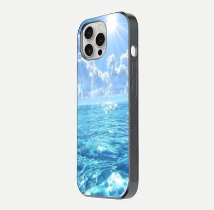 Endless Ocean Horizon Glass Case for iPhone 16 Pro side-angle photo showing reflection glow and wave tone