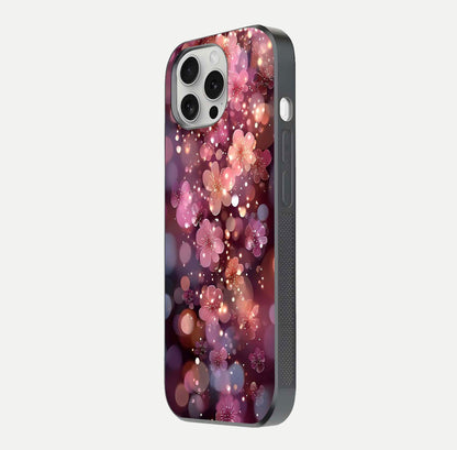 Glowing Petal Bliss Glass Case for iPhone 16 Pro side-angle image showing light reflection and soft floral texture