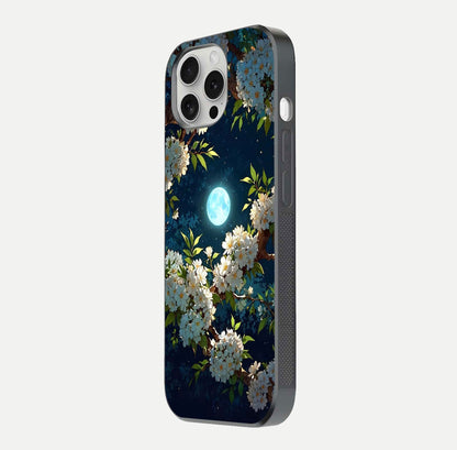 Moonlit Blossom Dream Glass Case for iPhone 16 Pro side-angle image showing shine depth and flower glow
