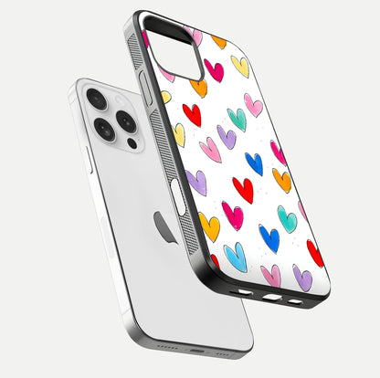 Playful Love Doodles iPhone 16 Pro glass phone case floating view emphasizing glossy finish and playful design