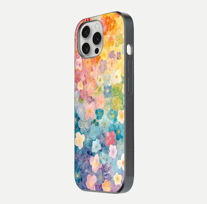 Rainbow Blossom Burst Glass Case for iPhone 16 Pro side-angle image showing reflection and floral burst detail