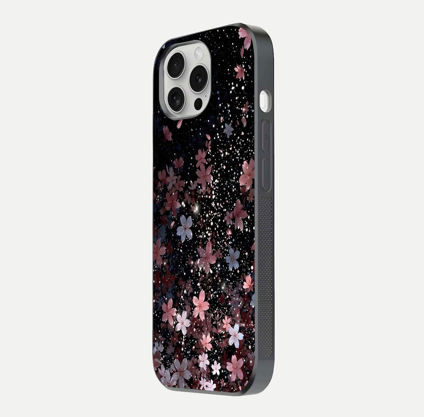 Starlit Flower Dreams Glass Case for iPhone 16 Pro side-angle image showing shine, edge detail, and floral contrast
