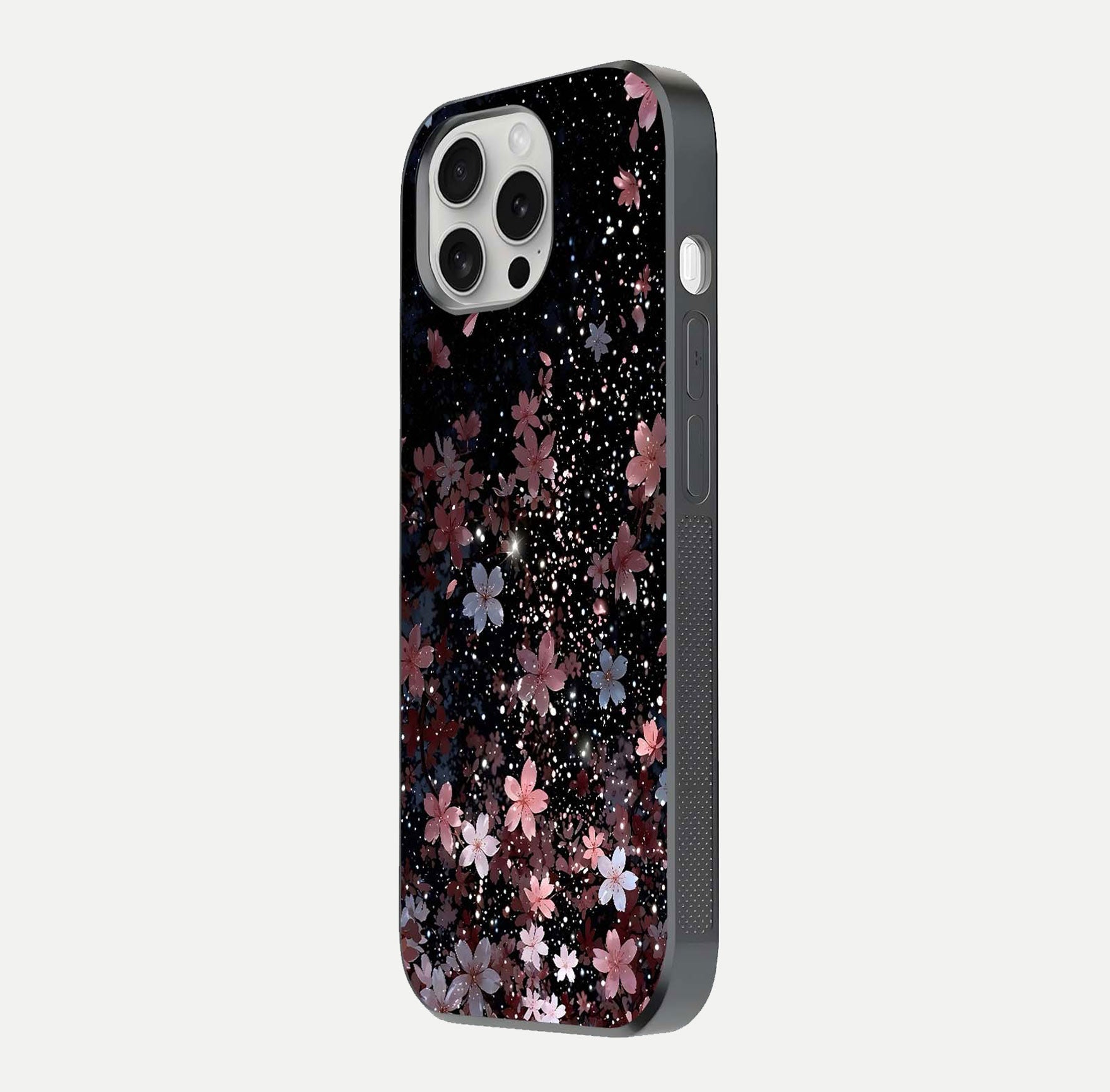 Starlit Flower Dreams Glass Case for iPhone 16 Pro side-angle image showing shine, edge detail, and floral contrast