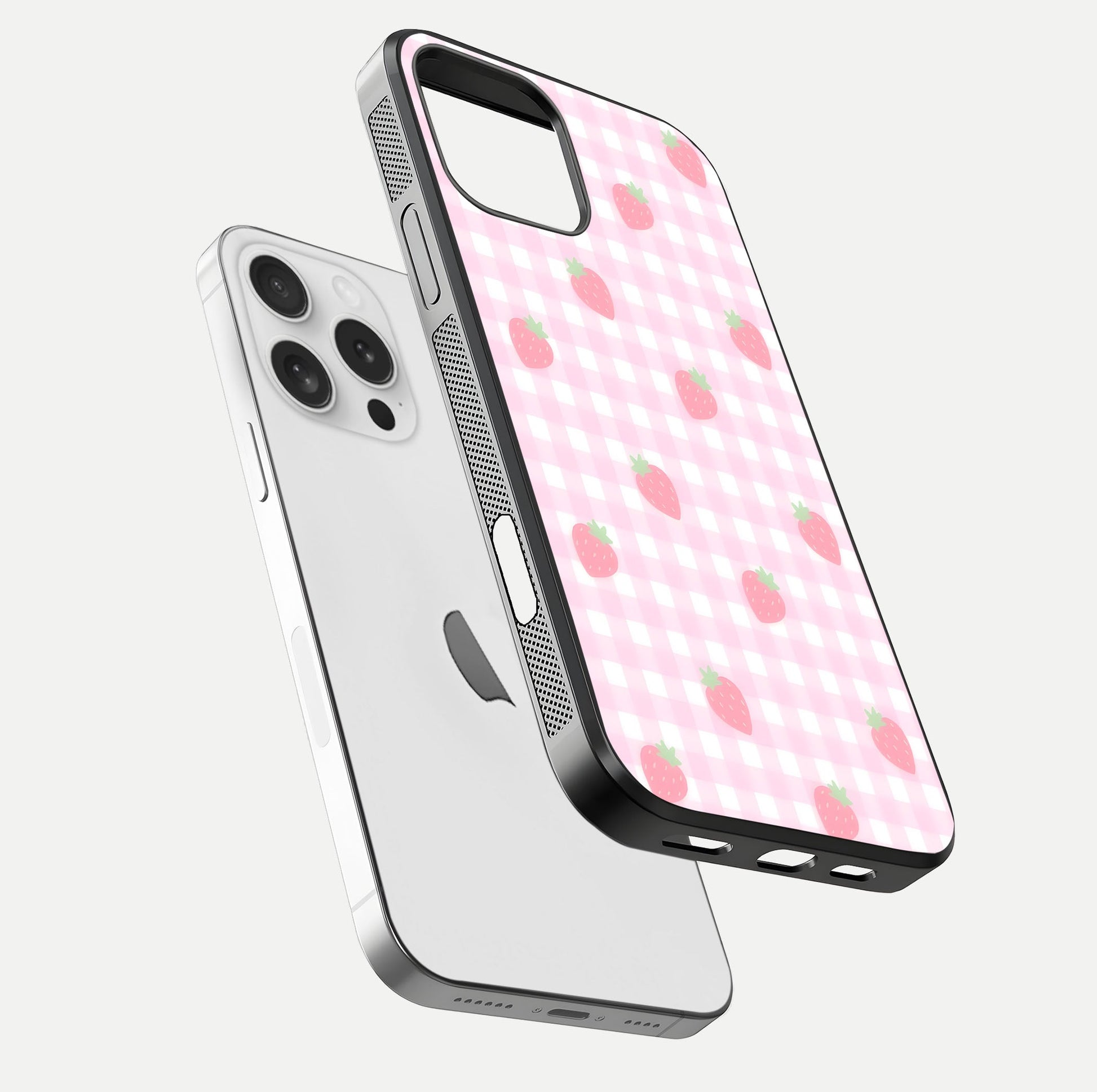 Strawberry Picnic Love iPhone 16 Pro glass phone case floating view emphasizing glossy finish and playful charm