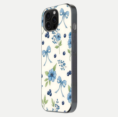 Blue Flower & Bow Glass Case for iPhone 16 Pro Max side-angle image showing bow-floral mix and HD finish shine
