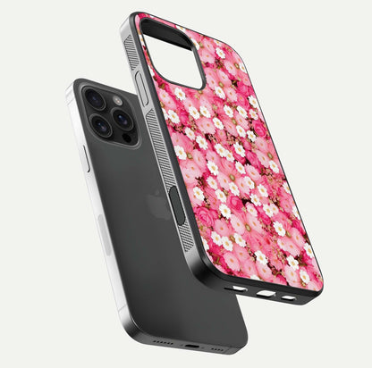 Pink Daisy Bliss Glass Case for iPhone 16 Pro Max floating dual-view mockup displaying gloss shine and pastel tones
