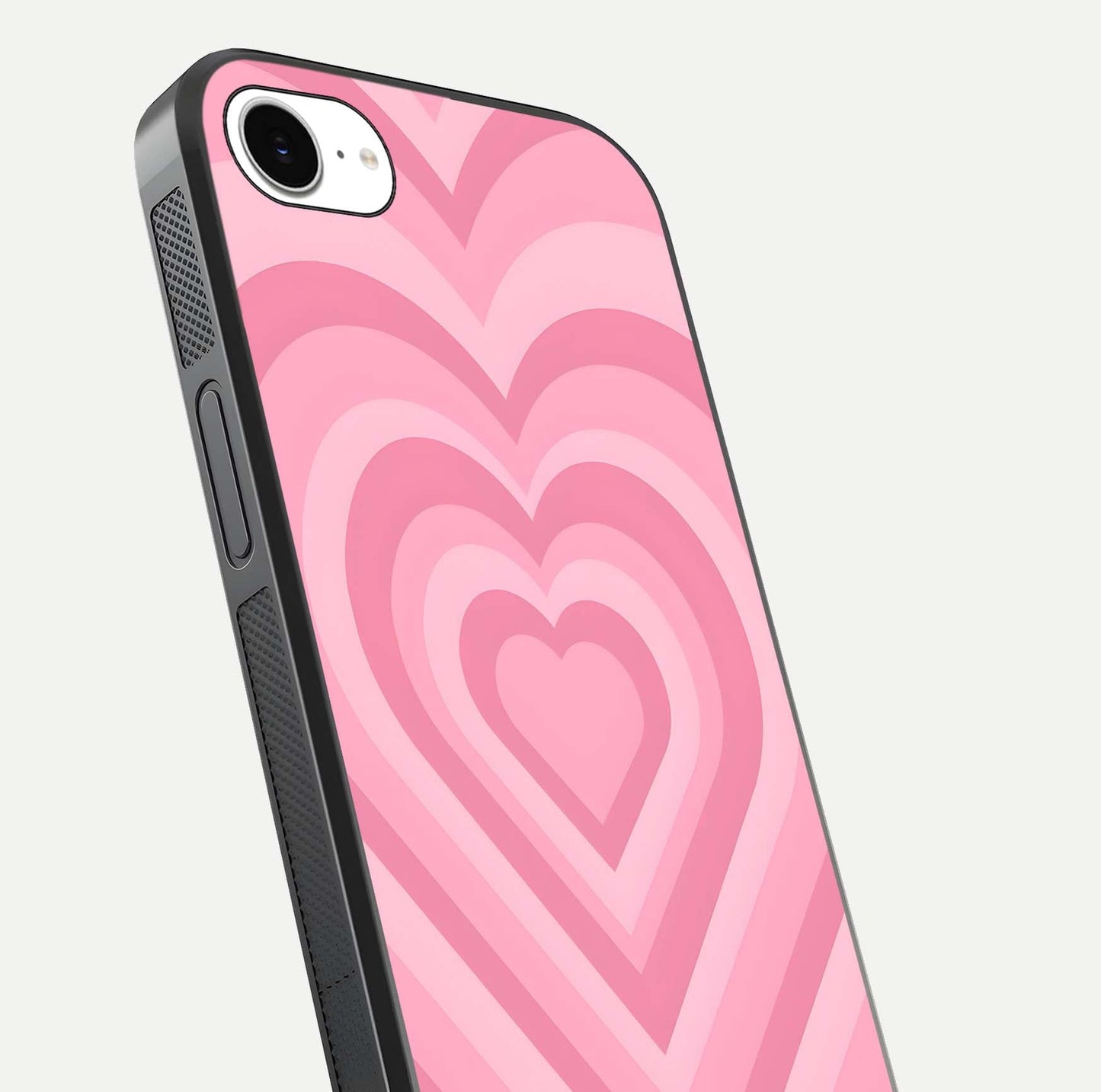 Blush Heart Waves iPhone 16e glass phone case angled back view highlighting romantic heart wave artwork and grip texture