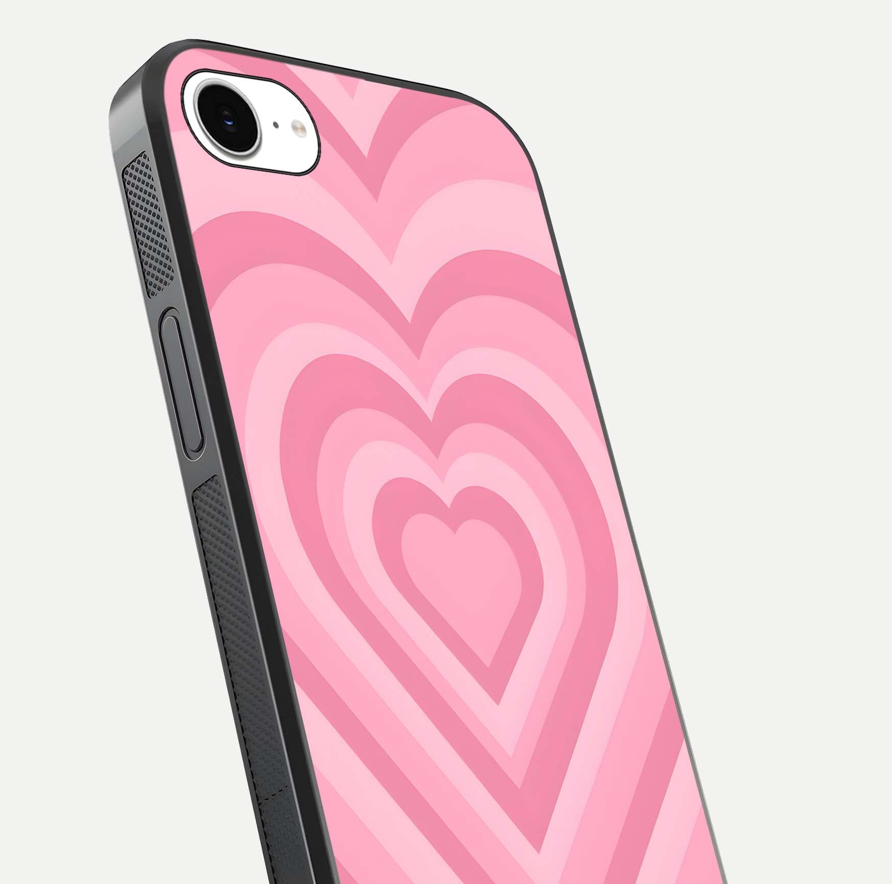 Blush Heart Waves iPhone 16e glass phone case angled back view highlighting romantic heart wave artwork and grip texture