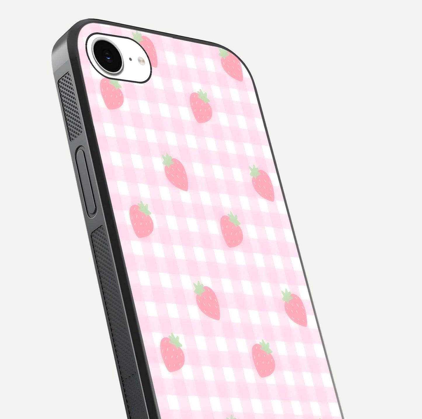Strawberry Picnic Love iPhone 16e glass phone case angled back view highlighting strawberry illustrations and textured grip