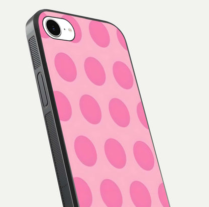 Sweet Dot Dreams iPhone 16e glass phone case angled back view highlighting dotted artwork and side grip texture