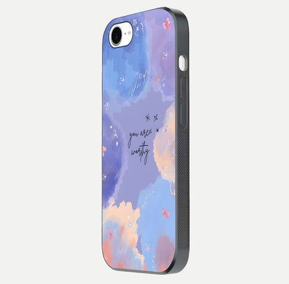 Celestial Cloud Magic Glass Case for iPhone 16e side-angle photo showing edge reflection and dreamy texture