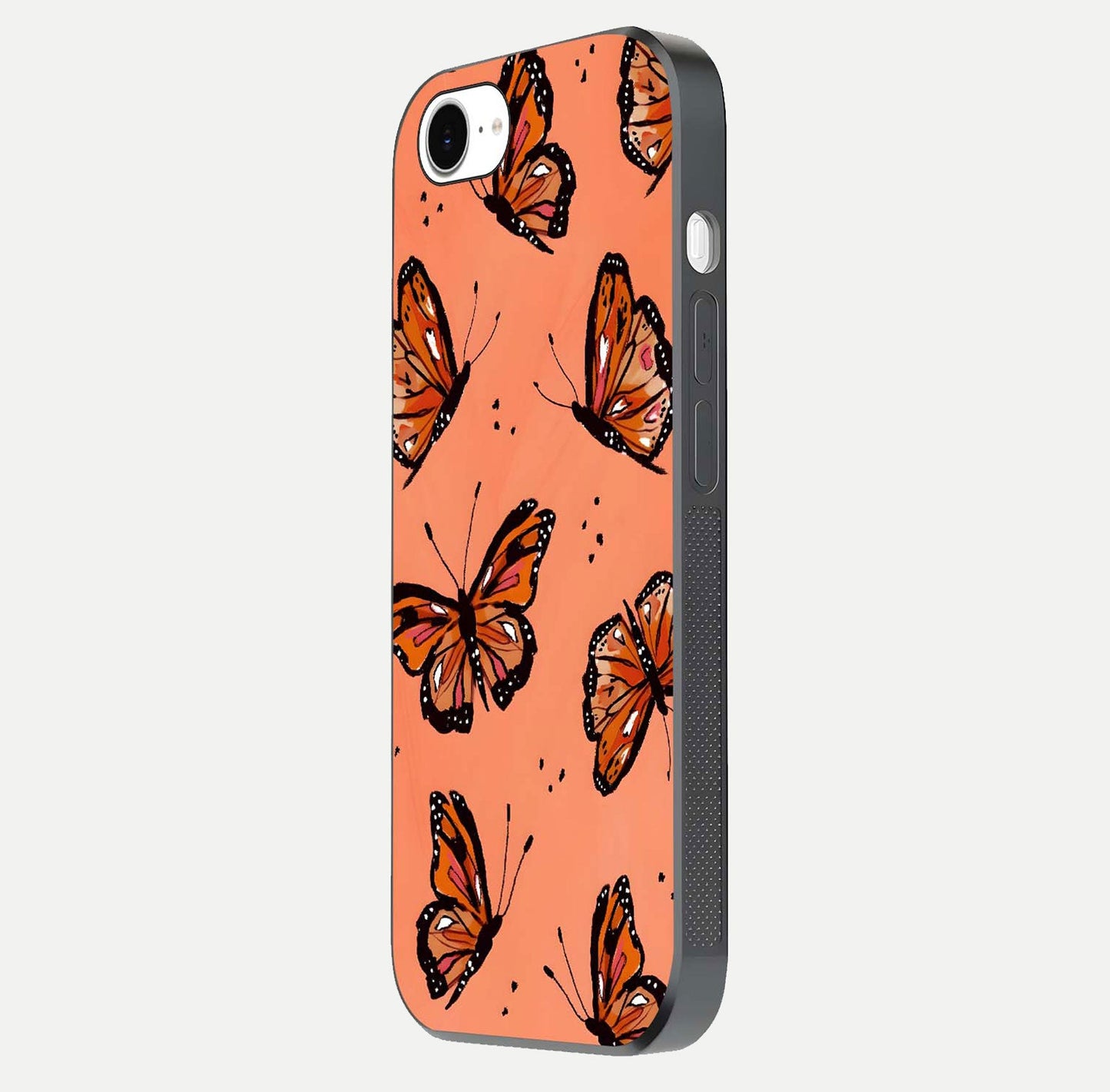 Coral Wing Butterfly Glass Case for iPhone 16e side-angle photo showing reflective finish and smooth edges