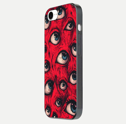 Crimson Watch Eyes Glass Case for iPhone 16e side-angle photo showing reflection texture and shine